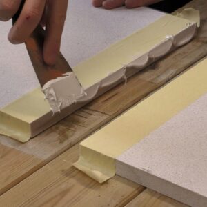 Applying Stonegate Bondex adhesive to stone worktop joint